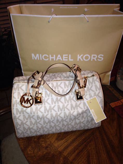 real michael kors bags|michael kors bag price.